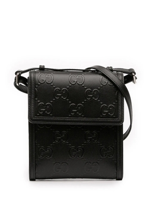 Gucci Pre-Owned 2016-2025 GG Embossed Leather Flap crossbody bag - Black