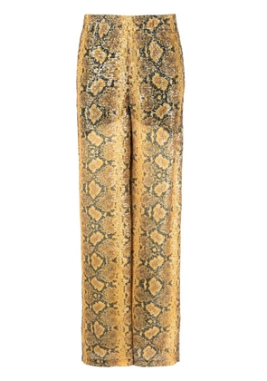 GCDS sequin-embellished snakeskin-print trousers - Yellow