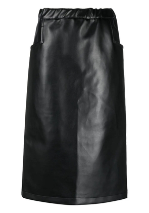 Black Comme Des Garçons high-waisted faux leather skirt