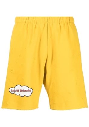 Natasha Zinko distressed-effect track shorts - Yellow