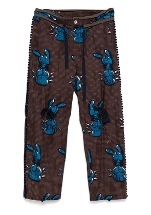 midorikawa graphic-print trousers - Brown