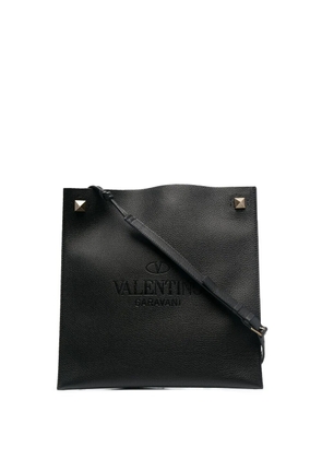 Valentino Garavani logo-embossed messenger bag - Black