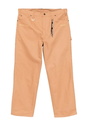 Mastermind Japan x Dickies graphic-print trousers - Brown