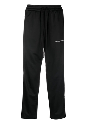 Ih Nom Uh Nit logo-print drawstring trousers - Black
