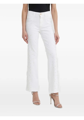 GUESS USA rhinestone-embellished flared jeans - White