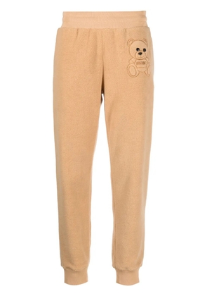 Moschino Teddy-bear detail cropped trousers - Neutrals
