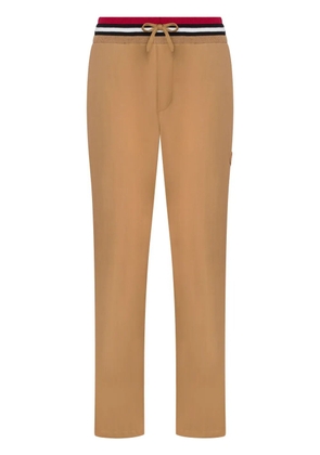 Moschino logo-appliqué track pants - Brown
