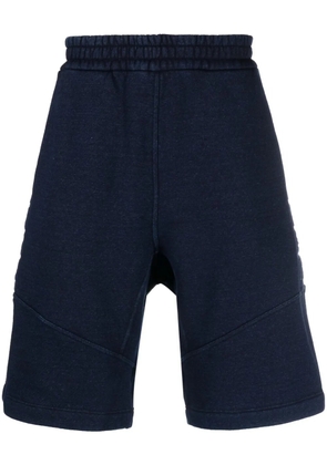 FENDI embossed-monogram denim shorts - Blue