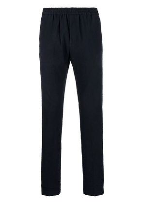 Tommy Hilfiger seersucker-texture track pants - Blue