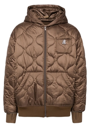 Undercover appliqué logo down jacket - Brown