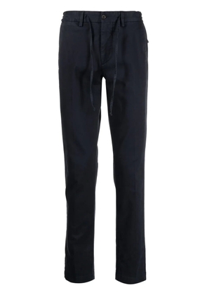Corneliani drawstring tapered trousers - Blue