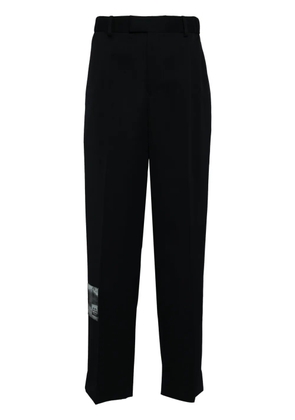 Undercover patched chinos - Blue