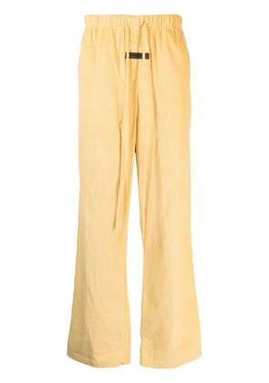 FEAR OF GOD ESSENTIALS drawstring corduroy track pants - Yellow