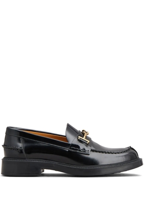 Tod's logo-plaque leather loafers - Black