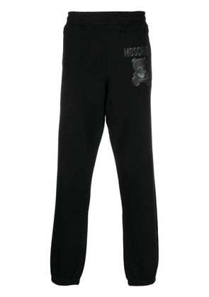 Moschino logo-print organic cotton track pants - Black