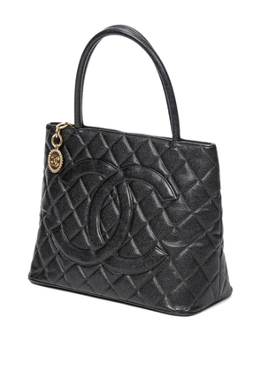 CHANEL Pre-Owned quilted logo-charm tote bag - Black