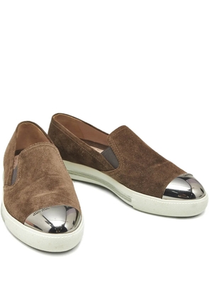 Miu Miu Pre-Owned metal-cap slip-on sneakers - Brown