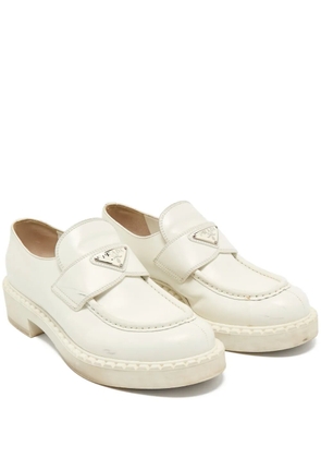 Prada Pre-Owned leather plaque loafers - Neutrals