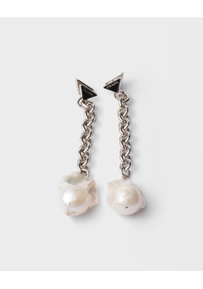 Metal and pearl earrings