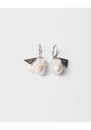 Metal and pearl earrings