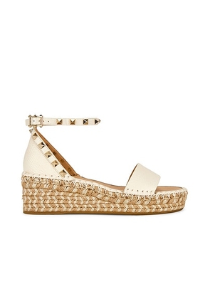 Valentino Garavani Rockstud Espadrille Sandal in Light Ivory & Naturale - Cream. Size 36 (also in 37, 38, 39, 40, 41).