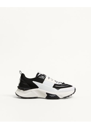 Valentino Garavani True Act Low Top Trainer In Mesh And Rubberised Fabric Man BLACK/WHITE 39