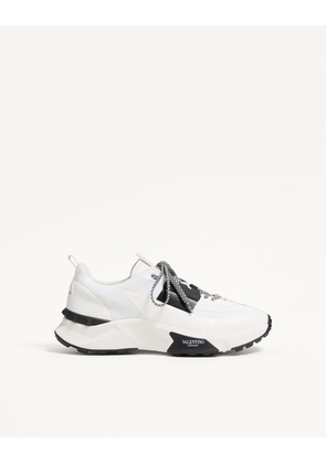 Valentino Garavani True Act Low Top Trainer In Mesh And Rubberised Fabric Man WHITE/ BLACK 39