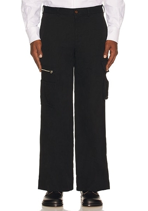 COMME des GARCONS BLACK Garment Treated Cargo Pocket Pant in Black - Black. Size L (also in M).
