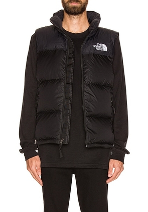The North Face 1996 Retro Nuptse Vest in Recycled TNF Black - Black. Size L (also in ).