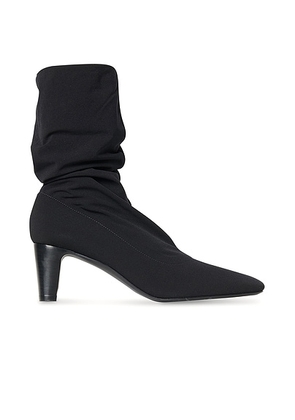 The Row Felice Stretch Boot in Black - Black. Size 37 (also in 38, 39, 40, 41).