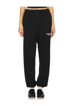 Fear of God ESSENTIALS Fleece Essential Sweatpant in Black. Size L. Also in XL/1X, XXL/2X.