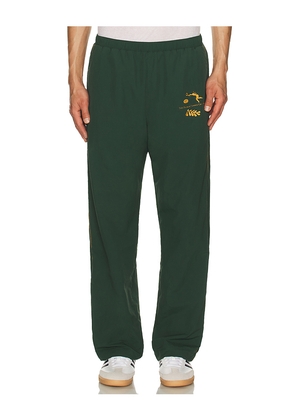 Palmes Track Pants in Dark Green. Size L. Also in M.
