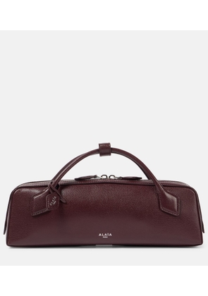Alaia Le Teckel leather clutch