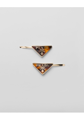 Plexiglas and metal barrette