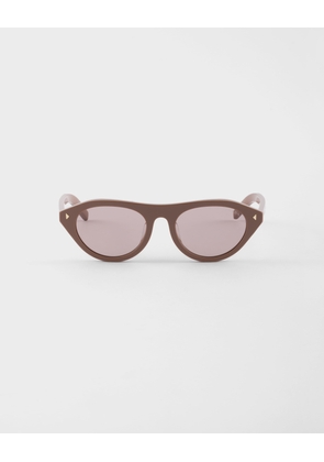 Prada sunglasses with the iconic metal plaque