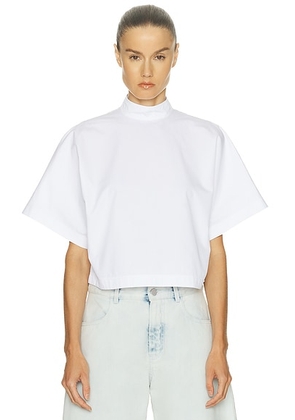 ALAÏA High Neck Top in Blanc - White. Size 36 (also in ).