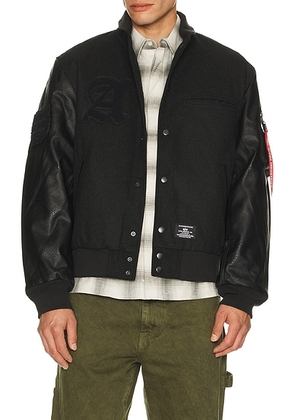 ALPHA INDUSTRIES Letterman Jacket in Black - Black. Size S (also in XL/1X).