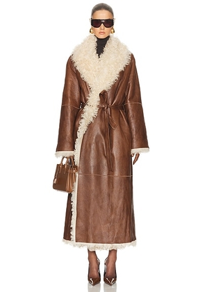 Magda Butrym Long Belted Shearling Reversible Coat in Brown - Brown. Size 36 (also in ).