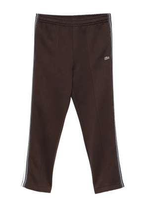 Lacoste logo-embroidered trousers - Brown