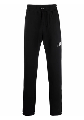 AMIRI logo-print track pants - Black