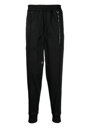 Mastermind World logo-print drawstring track pants - Black