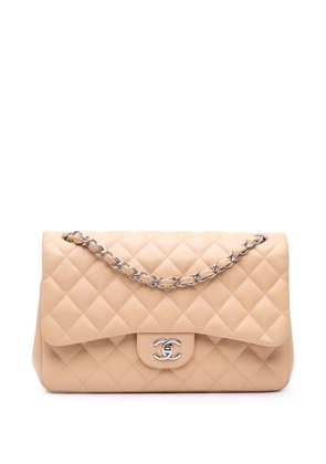 CHANEL Pre-Owned 2011 Jumbo Classic Lambskin Double Flap shoulder bag - Brown