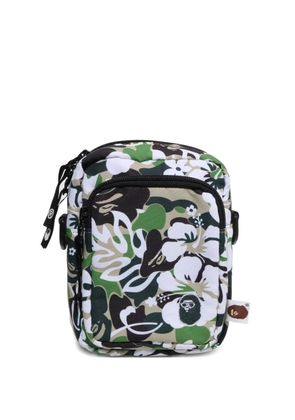 A BATHING APE® hibiscus-print camouflage messenger bag - Green