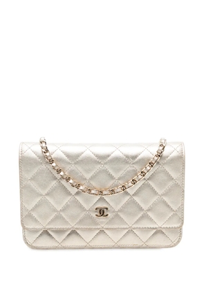 CHANEL Pre-Owned 2013-2014 CC Quilted Metallic Lambskin Wallet on Chain crossbody bag - Gold