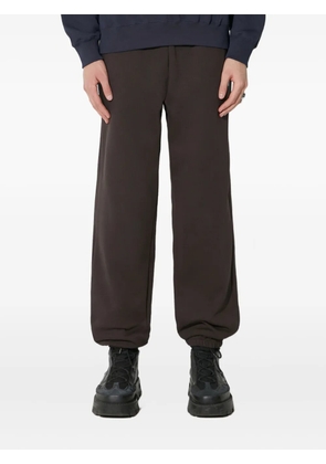 Wood Wood logo-patch track pants - Brown