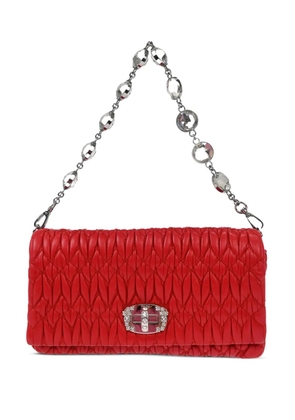 Miu Miu Pre-Owned 2010s matelassé-effect shoulder bag - Red