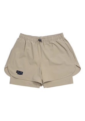 UNNA logo-patch shorts - Neutrals
