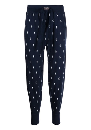 Polo Ralph Lauren all-over pony print trousers - Blue