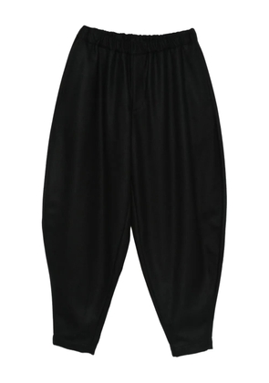 Black Comme Des Garçons wool trousers