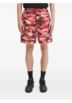 A BATHING APE® palm-tree printed shorts - Red